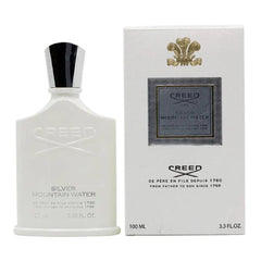 Creed Silver Mountain Water perfume bottle and packaging on a white background