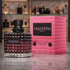 Valentino perfume bottle and packaging on a reflective surface with blurred shelves in the background