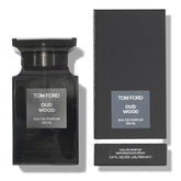 Tom Ford Oud Wood perfume bottle and packaging on a white background
