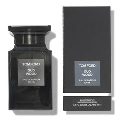 Tom Ford Oud Wood perfume bottle and packaging on a white background
