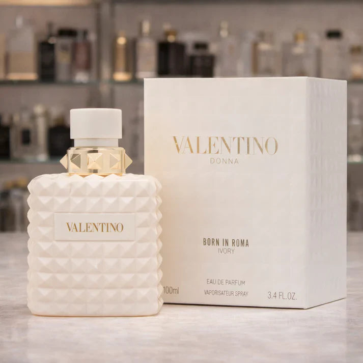 Valentino perfume bottle and packaging on a blurred background