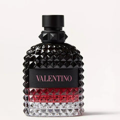 Valentino perfume bottle with black, red, and clear design on a white background