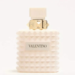 Valentino perfume bottle with gold cap on a white background