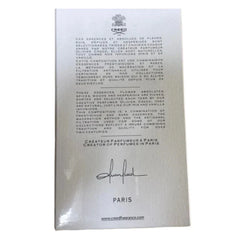 Creed perfume packaging with text and logo on a white background