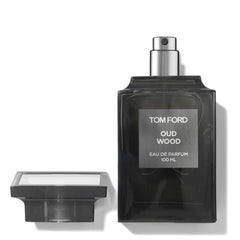 Tom Ford Oud Wood perfume bottle on a white background