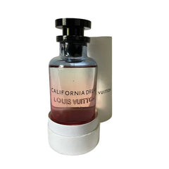Louis Vuitton perfume bottle with gradient design on a white background