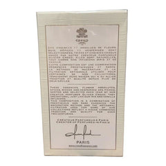Creed perfume packaging with text and logo on a white background