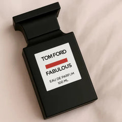 Tom Ford Fabulous perfume bottle on a beige background