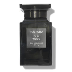 Black Tom Ford Oud Wood perfume bottle on a white background