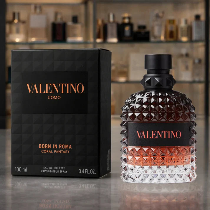 Valentino perfume bottle and packaging on a reflective surface with shelves in the background