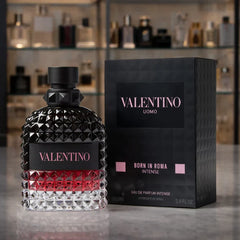 Valentino perfume bottle and packaging on a reflective surface with blurred shelves in the background