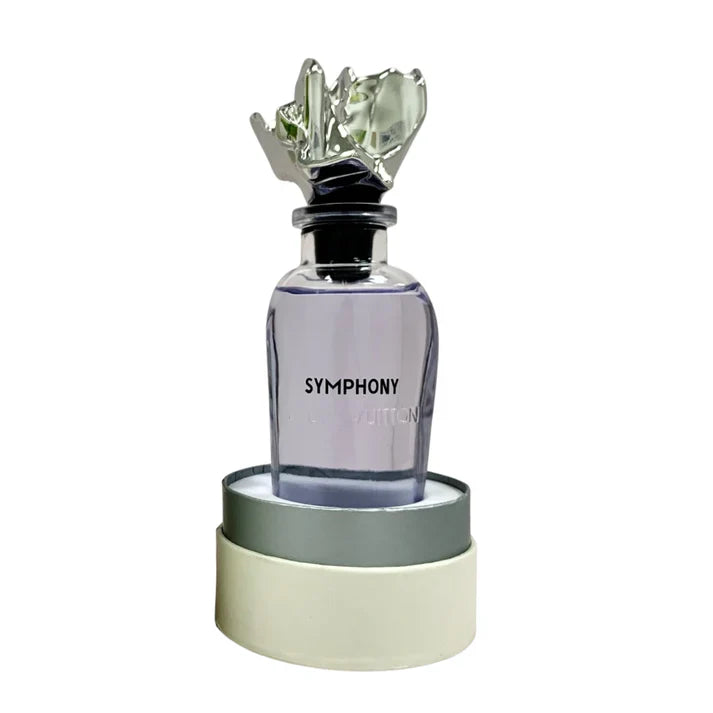 Perfume bottle with decorative cap on a white background