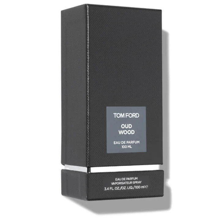 Black Tom Ford Oud Wood eau de parfum packaging on a white background