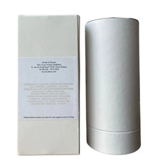 White cylindrical container and packaging with text on a white background