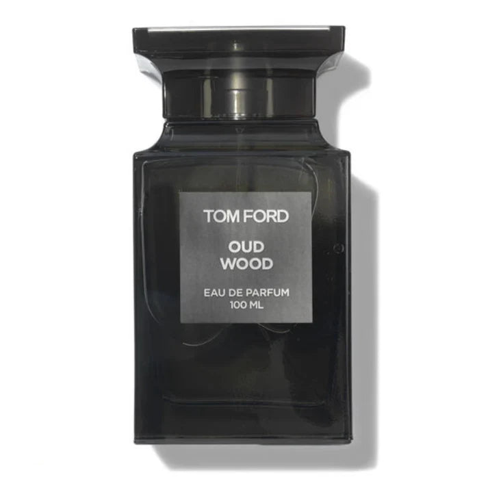 Black Tom Ford Oud Wood perfume bottle on a white background