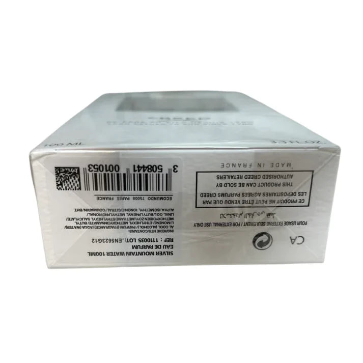 White box with text and barcodes on a white background
