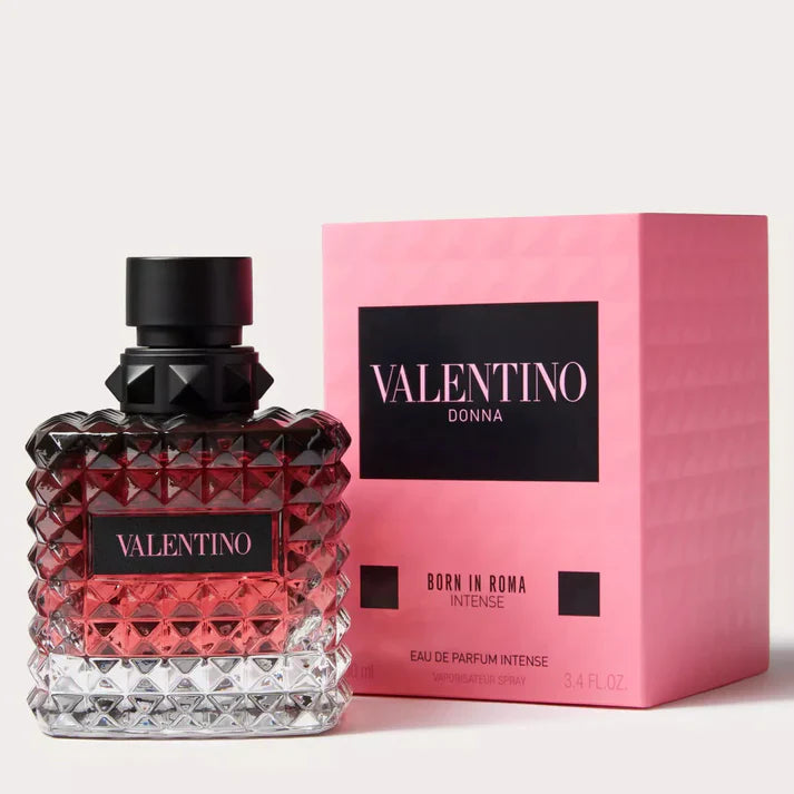 Valentino perfume bottle and packaging on a light gray background