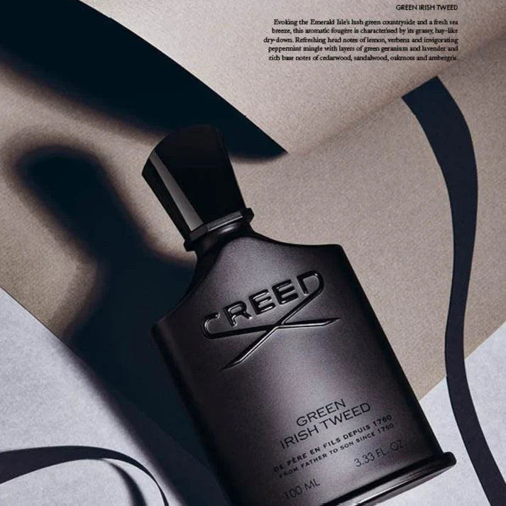 Creed Green Irish Tweed perfume bottle on a textured surface with soft shadows