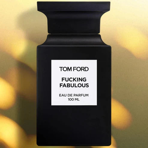 Black Tom Ford perfume bottle with 'Fucking Fabulous' text on a blurred background