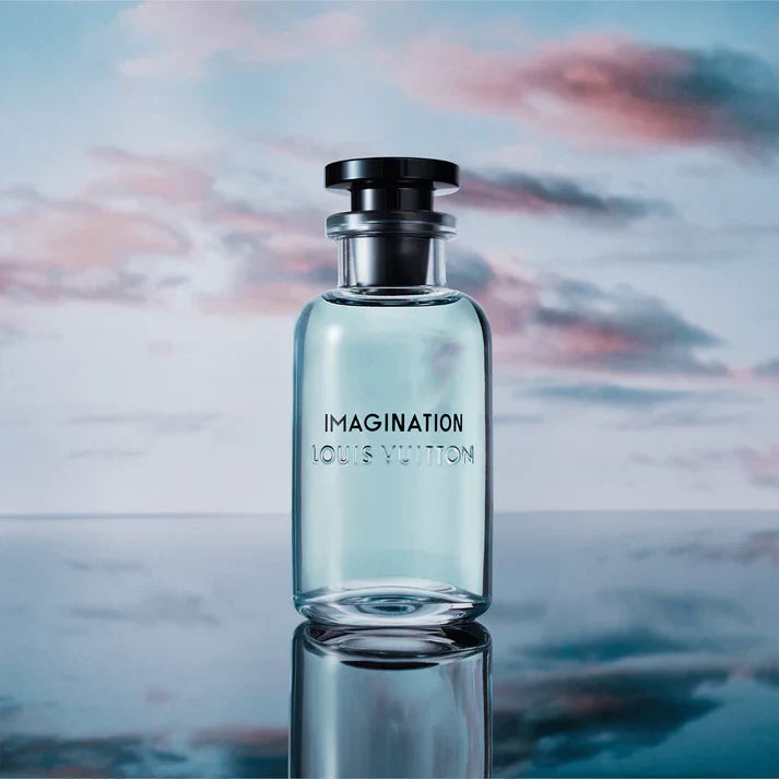 Louis Vuitton 'Imagination' perfume bottle with a blurred sky background